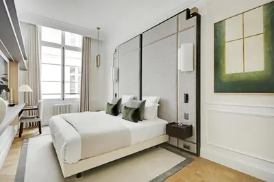 Un ou plusieurs lits dans un hébergement de l'établissement TheLander - Serviced Apartments in Louvre