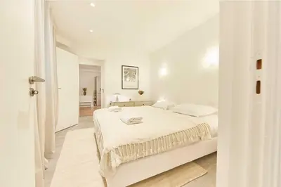 Un ou plusieurs lits dans un hébergement de l'établissement Classy Apartment 2BD-4P - Eiffel Tower