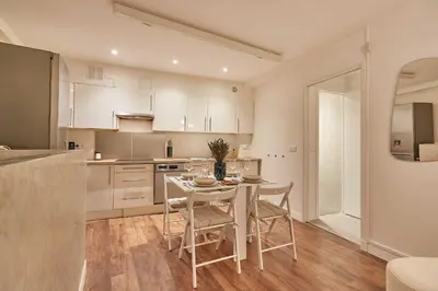 Cuisine ou kitchenette dans l'établissement Classy Apartment 2BD-4P - Eiffel Tower