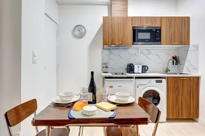 Cuisine ou kitchenette dans l'établissement 397 Suite Glamour - Superbe Studio à Paris