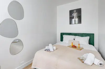 Un ou plusieurs lits dans un hébergement de l'établissement 397 Suite Glamour - Superbe Studio à Paris