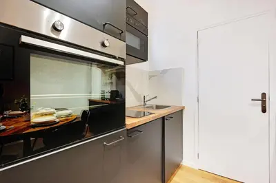 Cuisine ou kitchenette dans l'établissement Charming apartment with terrasse - 1BDR- 6P - Sacré-Cœur