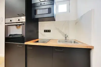 Cuisine ou kitchenette dans l'établissement Charming apartment with terrasse - 1BDR- 6P - Sacré-Cœur