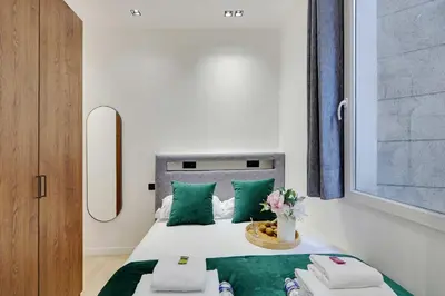 Un ou plusieurs lits dans un hébergement de l'établissement Amazing studio 2P - Montorgueil - 4