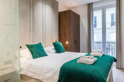 Un ou plusieurs lits dans un hébergement de l'établissement Perfect for exploring - 2BR-6P - Center of Paris