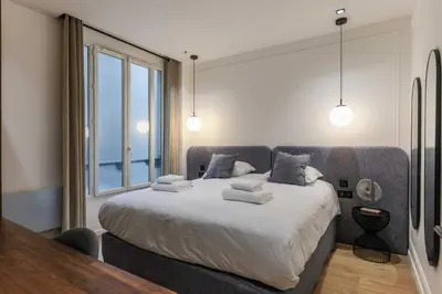 Un ou plusieurs lits dans un hébergement de l'établissement Perfect for exploring - 2BR-6P - Center of Paris