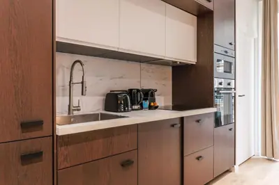 Cuisine ou kitchenette dans l'établissement Perfect for exploring - 2BR-6P - Center of Paris