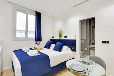 Un ou plusieurs lits dans un hébergement de l'établissement Studio ideally located in the heart of Paris