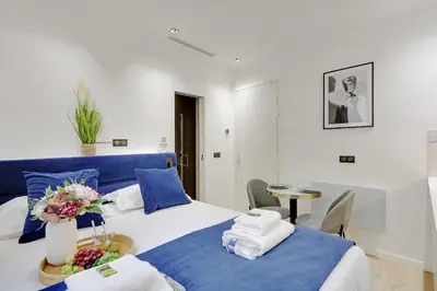 Un ou plusieurs lits dans un hébergement de l'établissement Studio ideally located in the heart of Paris