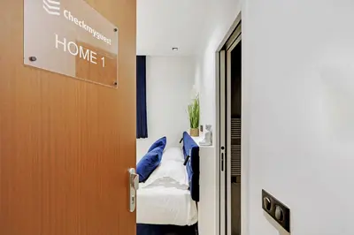 Un ou plusieurs lits dans un hébergement de l'établissement Studio ideally located in the heart of Paris