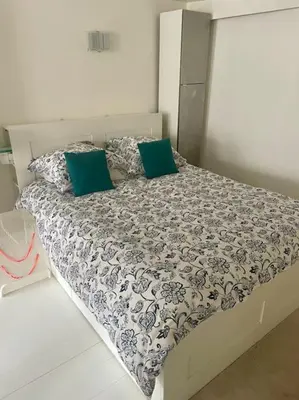 Un ou plusieurs lits dans un hébergement de l'établissement Marais Design flat