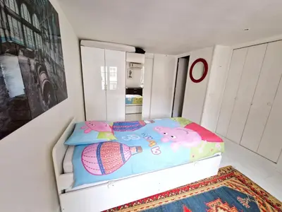 Un ou plusieurs lits dans un hébergement de l'établissement Marais Design flat