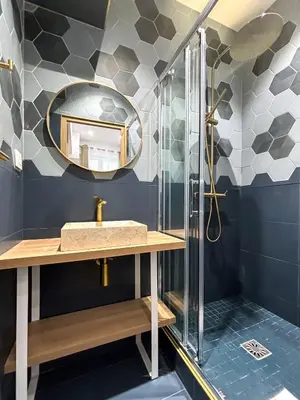Salle de bains dans l'établissement Nets Inn apartments - La Coulée Verte