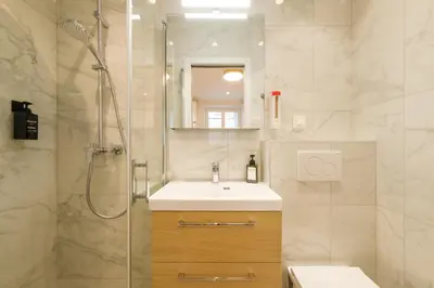 Salle de bains dans l'établissement Cosy apartment 3P - Place de l'Etoile