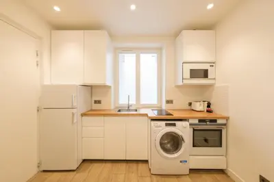 Cuisine ou kitchenette dans l'établissement Cosy apartment 3P - Place de l'Etoile