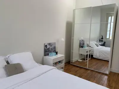 Un ou plusieurs lits dans un hébergement de l'établissement Appartement Tour Eiffel Invalides