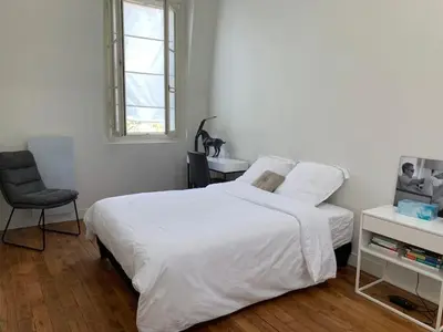 Un ou plusieurs lits dans un hébergement de l'établissement Appartement Tour Eiffel Invalides