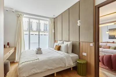 Un ou plusieurs lits dans un hébergement de l'établissement Exceptional 3 bedrooms Apartment Heart of Paris By Studio Prestige