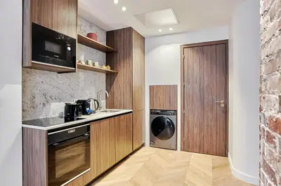 Cuisine ou kitchenette dans l'établissement Exceptional 3 bedrooms Apartment Heart of Paris By Studio Prestige