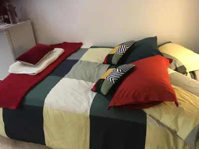 Un ou plusieurs lits dans un hébergement de l'établissement Appartement paris Tour Eiffel