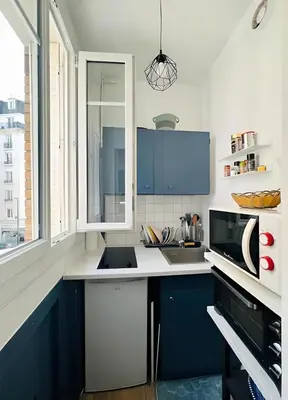 Cuisine ou kitchenette dans l'établissement Tie-Break Studio