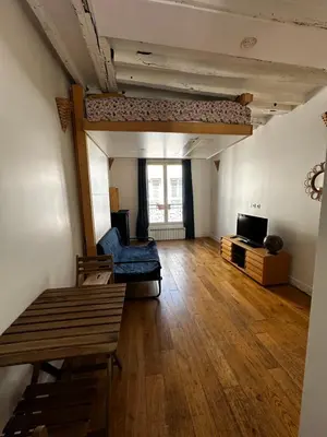 Coin salon dans l'établissement Paris 10e Sainte Marthe Canal Saint Martin 23m2