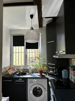 Cuisine ou kitchenette dans l'établissement Paris 10e Sainte Marthe Canal Saint Martin 23m2