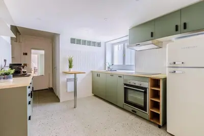 Cuisine ou kitchenette dans l'établissement Loft lumineux authentique