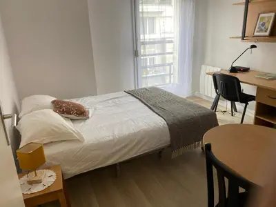 Un ou plusieurs lits dans un hébergement de l'établissement Cosy studio