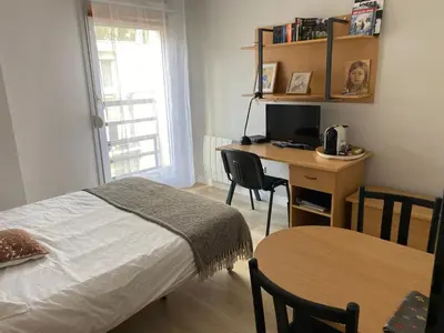 Un ou plusieurs lits dans un hébergement de l'établissement Cosy studio