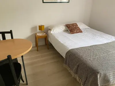 Un ou plusieurs lits dans un hébergement de l'établissement Cosy studio