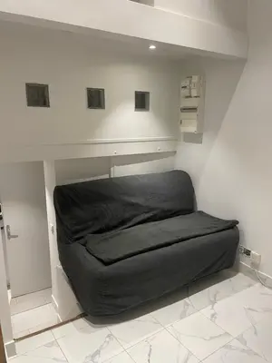 Coin salon dans l'établissement Appartement à côté du Sacrée cœur et Montmartre