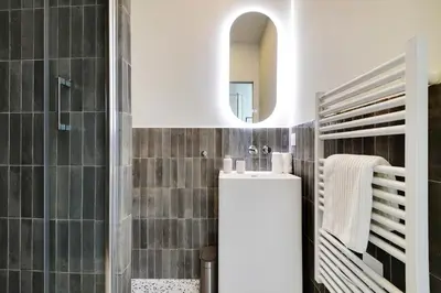 Salle de bains dans l'établissement Cosy Duplex