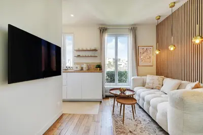 Cuisine ou kitchenette dans l'établissement Cosy Duplex