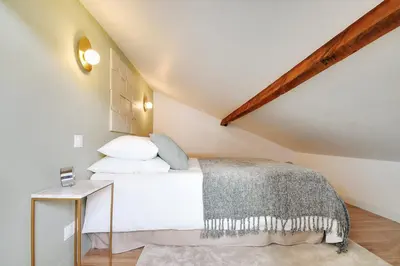 Un ou plusieurs lits dans un hébergement de l'établissement Cosy Duplex