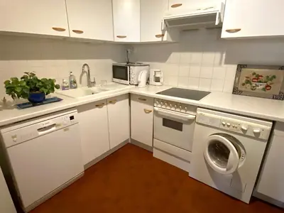Cuisine ou kitchenette dans l'établissement L'appartement Picquet