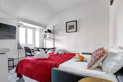 Un ou plusieurs lits dans un hébergement de l'établissement 542 Suite Montrouge - Appartement proche de Paris