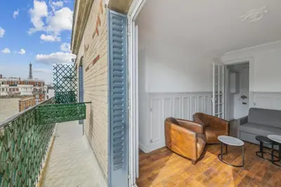 Coin salon dans l'établissement 550 Suite Quinault - Superbe Appartement à Paris