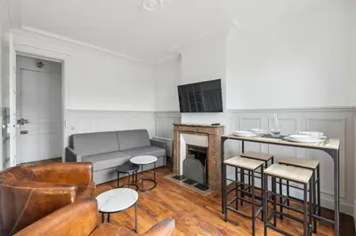 Télévision ou salle de divertissement dans l'établissement 550 Suite Quinault - Superbe Appartement à Paris