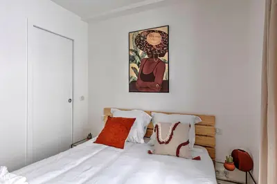 Un ou plusieurs lits dans un hébergement de l'établissement 556 Suite Wagram - Superbe Appartement à Paris