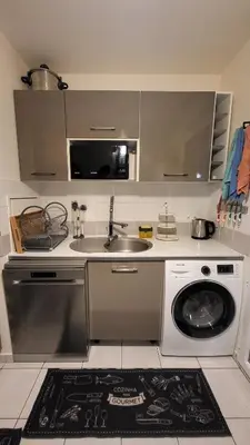 Cuisine ou kitchenette dans l'établissement Home Sweet Home