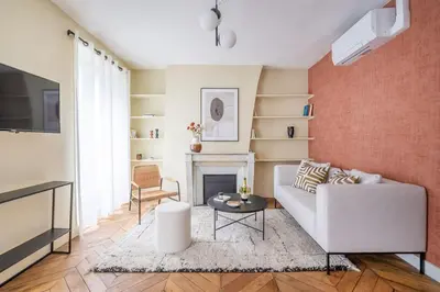 Coin salon dans l'établissement 1#Two Bedrooms#Champs Elysées#Arc de Triomphe#AC