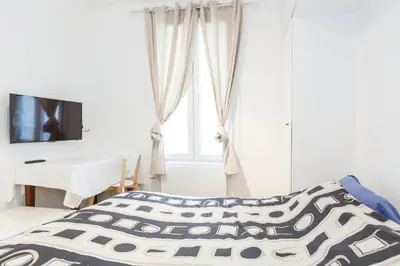 Un ou plusieurs lits dans un hébergement de l'établissement Paris studio Rue du Maine in Montparnasse - next to train station, close to 6th arrondissement