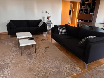 Coin salon dans l'établissement 3 bedrooms with Tour Eiffel view