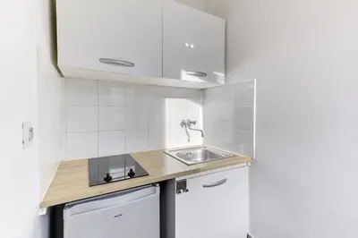 Cuisine ou kitchenette dans l'établissement 568 Suite Dulong - Superbe studio parisien