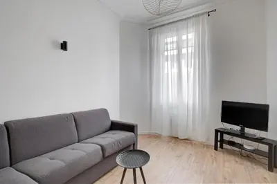 Télévision ou salle de divertissement dans l'établissement 570 Suite Bloom - Superbe Appartement à Paris