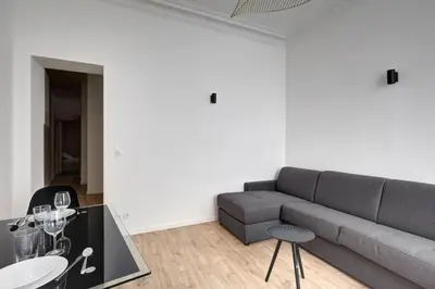 Coin salon dans l'établissement 570 Suite Bloom - Superbe Appartement à Paris