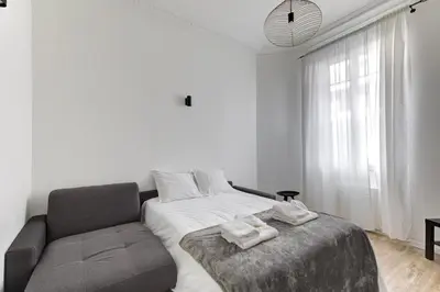 Un ou plusieurs lits dans un hébergement de l'établissement 570 Suite Bloom - Superbe Appartement à Paris