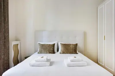 Un ou plusieurs lits dans un hébergement de l'établissement Sublime apartment - 2BR-4P - Arc de Triomphe