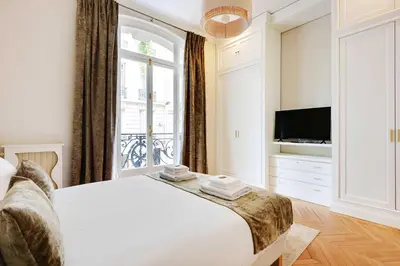 Un ou plusieurs lits dans un hébergement de l'établissement Sublime apartment - 2BR-4P - Arc de Triomphe